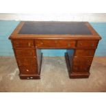 A VICTORIAN INLAID TWIN PEDESTAL DESK OF SMALL PROPORTIONS