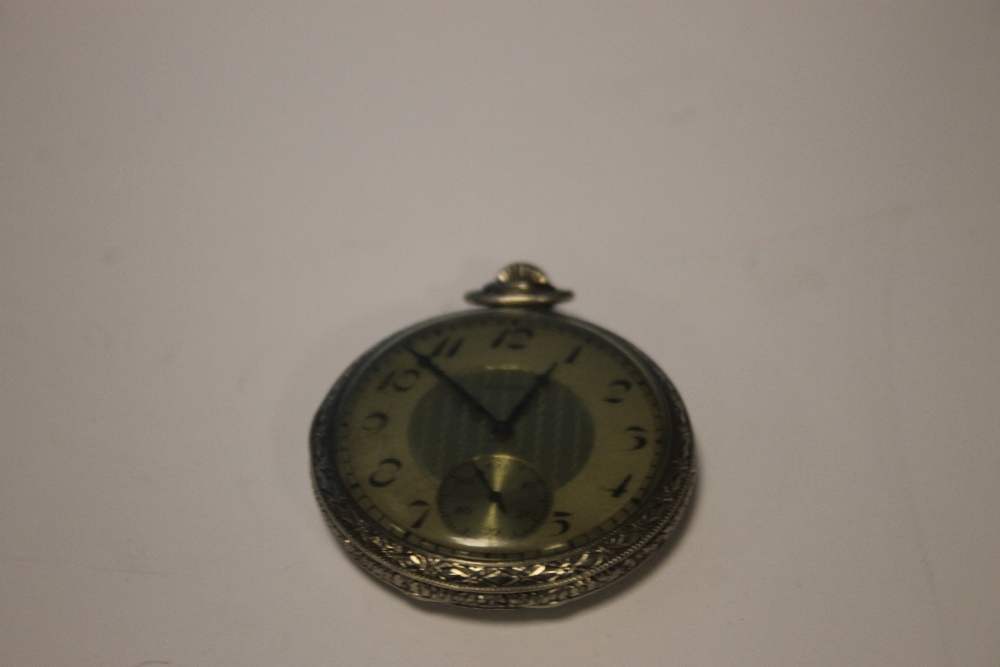 AN ELGIN WHITE METAL CASED OPEN FACED POCKET WATCH WITH SUB SECONDS DIAL AND FOLIATE DECORATION