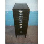 A GREEN FILING CABINET