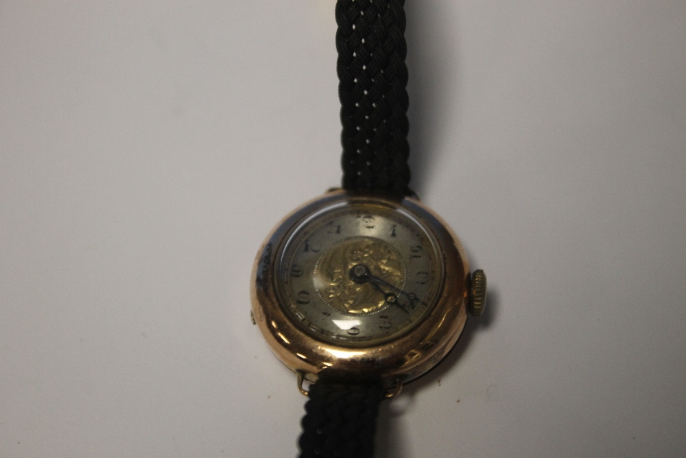 A LADIES 9CT GOLD WRISTWATCH ON A LATER STRAP
