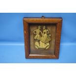 A FRAMED 19TH CENTURY BRONZED PLAQUE OF A COUPLE IN A WALNUT FRAME, INSCRIPTION TO REVERSE, THIS