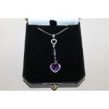 A 9 CT WHITE GOLD AND AMYTHEST NECKLACE