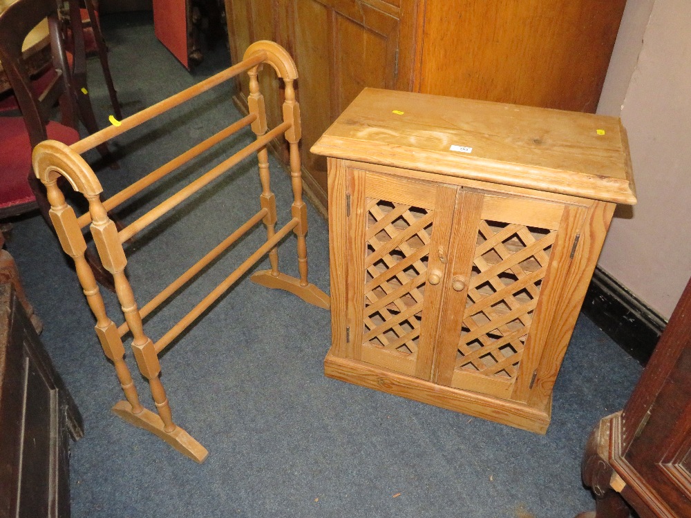 A MODERN LATTICE PINE CUPBOARD WITH A TOWEL RAIL (2)