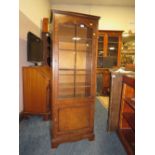 A 20TH C WALNUT GLAZED SLIM BOOKCASE H-165 CM W-60 CM