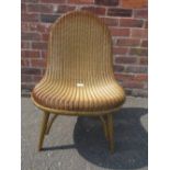 A LLOYD LOOM GOLD CHAIR