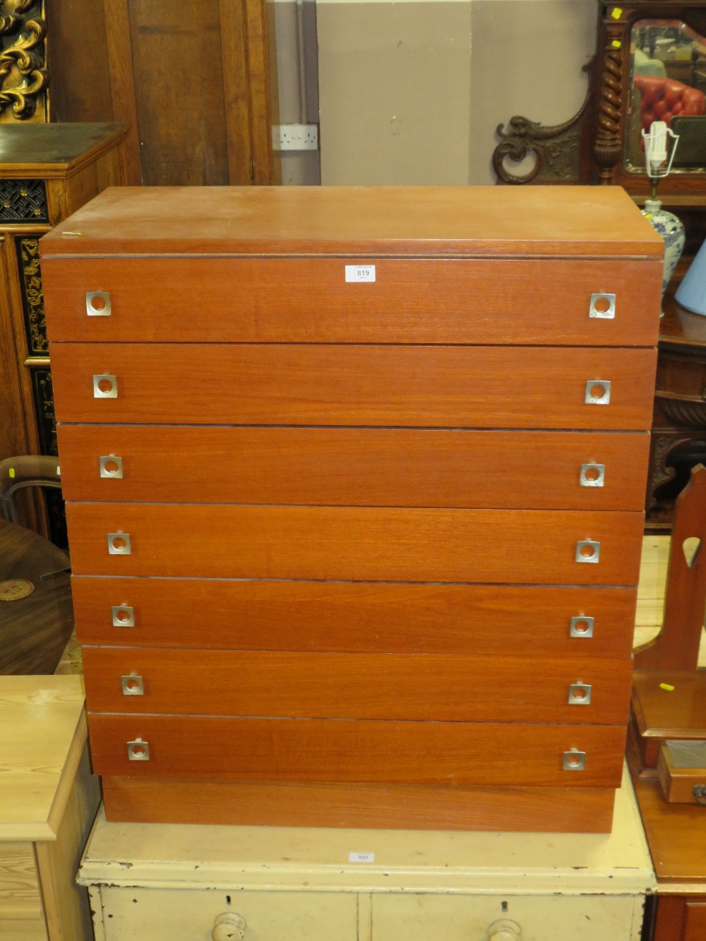 A RETRO TEAK SEVEN DRAWER CHEST W-81 CM