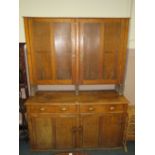 A LARGE ANTIQUE OAK HOUSEKEEPERS CUPBOARD H-244 CM W-184 CM A/F
