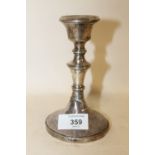 A HALLMARKED SILVER CANDLE STICK, SPLIT AND TWISTED AT THE BASE