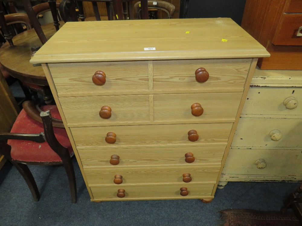 A MODERN PINE EFFECT SIX DRAWER CHEST S/D