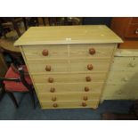 A MODERN PINE EFFECT SIX DRAWER CHEST S/D