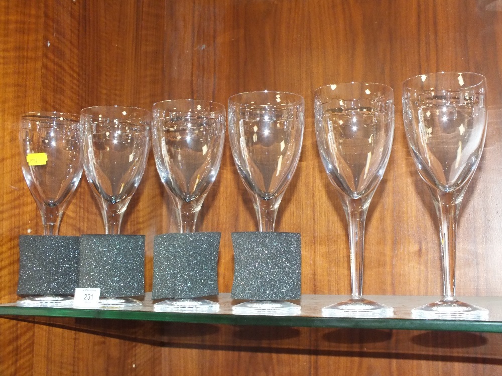 A SET OF SIX JOHN ROCHA WATERFORD CRYSTAL WINE GLASSES