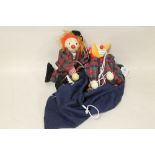 TWO WOODEN CLOWN PUPPETS