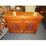 AN EDWARDIAN MAHOGANY CARVED SIDEBOARD WITH TWO DRAWERS H-89 W-116 CM