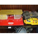 A VINTAGE CHILDS ESSO PLAY GARAGE TOGETHER WITH A DEMON DRAGON TANK AND A THUNDERBIRD 4 FIGURE (A/