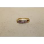 A HALLMARKED 9 CT GOLD PINK SAPPHIRE DRESS RING, APPROX WEIGHT 2.5 G