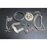 A SMALL COLLECTION OF SILVER AND OTHER JEWELLERY, to include a Chinese type carved bone pendant,