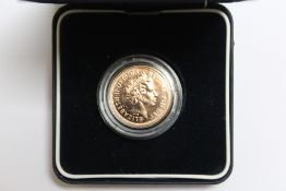 A CASED ELIZABETH II 2005 GEORGE AND THE DRAGON BACKED GOLD SOVEREIGN