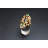 A MUTLI STONE GEM SET RING, set with diamonds, emeralds, rubies and sapphires, stamped 750, approx