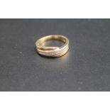 A CHANNEL SET BRILLIANT CUT DIAMOND RING, stamped Cardow 14k585, approx weight 4.6g ring size Q