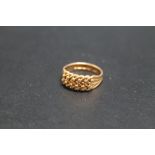 A HALLMARKED 18 CARAT GOLD KEEPER RING, approx weight 4.7g, ring size L
