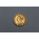 AN AMERICAN 1897 GOLD TEN DOLLAR COIN