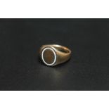 A 9CT GOLD AND ENAMEL SIGNET RING, marks rubbed, approx weight 7.2g, ring size N