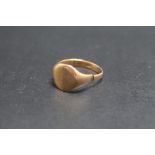 A GENTS 9CT GOLD SIGNET RING, band warped and split, approx weight 2.9g