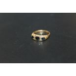 A HALLMARKED 9 CARAT GOLD THREE STONE SAPPHIRE AND DIAMOND RING, approx weight 4.3g, ring size L