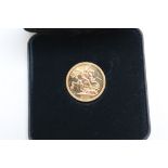 A CASED ELIZABETH II 2001 GOLD SOVEREIGN