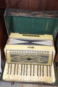 A VINTAGE 'RIOS' ACCORDION WITH CASE