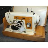 A FRISTER & ROSSMANN MODEL 45 ELECTRIC SEWING MACHINE