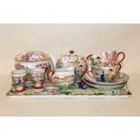 A CZECHOSLOVAKIAN VICTORIA ORIENTAL PATTERN TWO PERSON BREAKFAST SET