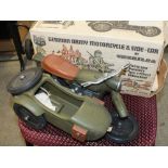 A BOXED CHERILEA GERMAN ARMY MOTORCYCLE AND SIDE CAR TOGETHER WITH A TIN PLATE LORRY TOY