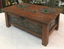 EARLY 20th CENTURY ARTS & CRAFTS OAK AND COPPER-MOUNTED BRIDGE BOX mounted with six copper panels