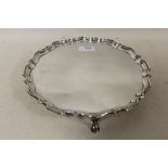 A HALLMARKED SILVER THREE FOOTED PLATTER, APPROX WEIGHT 650 G