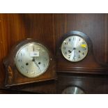 AN OAK CASED NAPOLEON HAT MANTEL CLOCK TOGETHER WITH A CARVED OAK EXAMPLE