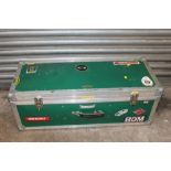 A LARGE HARD CASE CONTAINING CRICKET RELATED ITEMS TO INCLUDE A CRICKET BAT, PADS, HELMET ETC.