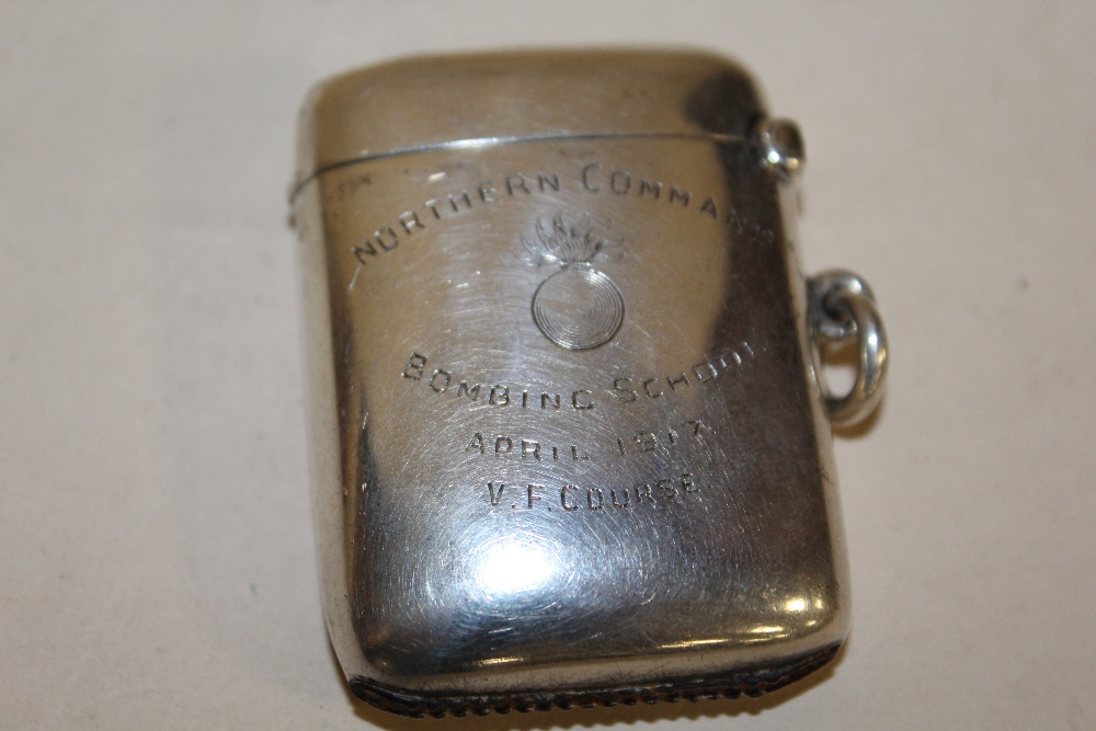 A HALLMARKED SILVER VESTA CASE ENGRAVED 'NORTHERN COMMAND BOMBING SCHOOL APRIL 1917 V.F. COURSE',