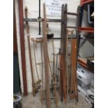 A SET OF VINTAGE WOODEN LADDERS TOGETHER WITH WOODEN CRUTCHES, VINTAGE CURTAIN POLE ETC