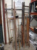 A SET OF VINTAGE WOODEN LADDERS TOGETHER WITH WOODEN CRUTCHES, VINTAGE CURTAIN POLE ETC