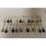 A QUANTITY OF UNUSUAL SEA SHELL HANDLED HORN BOWLED SPOONS AND SPORKS