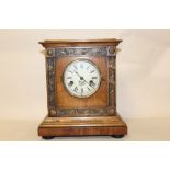 A MODERN MAHOGANY CASED MANTEL CLOCK