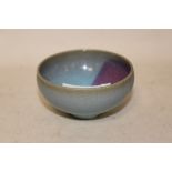 A SMALL ORIENTAL STYLE CRACKLE GLAZE BLUE AND PURPLE BOWL - DIAMETER 8.5CM