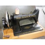 A VINTAGE SINGER SEWING MACHINE