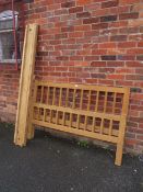 A MODERN STYLE OAK DOUBLE BED FRAME