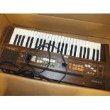 A BOXED CASIO CASIOTONE 401 KEYBOARD