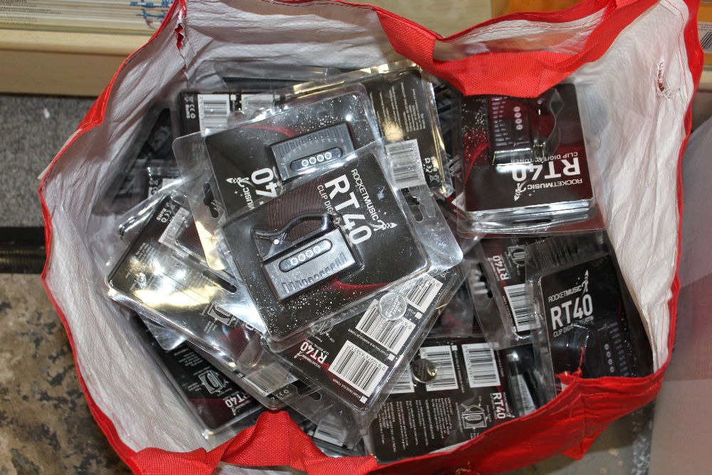 A QUANTITY OF PACKAGED ROCKET MUSIC RT40 CLIP DIGITAL UKULELE TUNERS