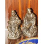 A PAIR OF HEREDITIES STYLE BRONZED FIGURES OF A FISHERMAN AND A HUNTSMAN