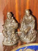A PAIR OF HEREDITIES STYLE BRONZED FIGURES OF A FISHERMAN AND A HUNTSMAN