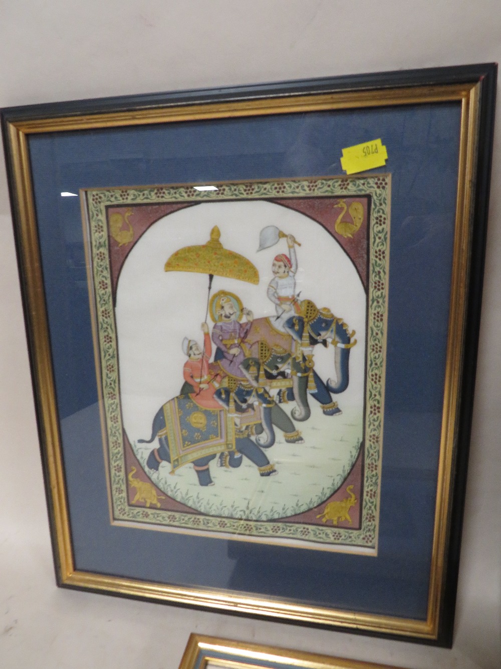 THREE FRAMED AND GLAZED EASTERN STYLE PAINTINGS OF FIGURES AND ELEPHANTS - Image 2 of 4